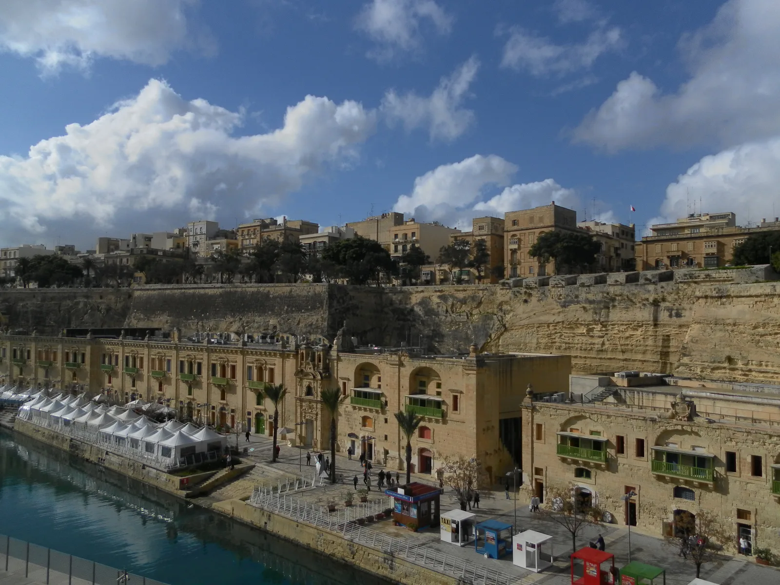 The Valletta Waterfront in Floriana with its restored warehouse arcades beside the Grand Harbour quay.